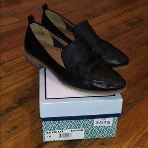 Black leather flats by Susina